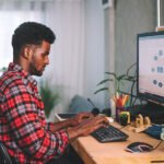 Hacks for Freelancers to Stay Focused young african american freelancer online work from acdg8w9