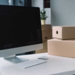 desktop computer with blank screen and cardboard b w9ynnhx.jpg